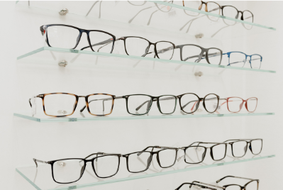 A photo of row of glasses on shelves