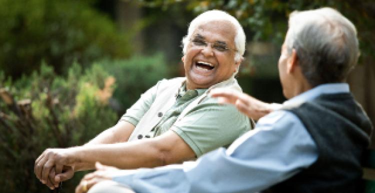 NHS Volunteering- picture of two men chatting