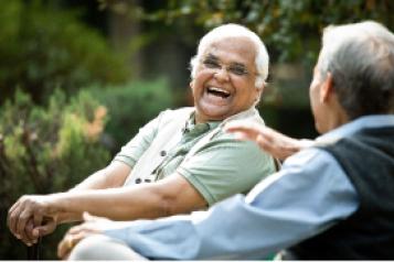 NHS Volunteering- picture of two men chatting