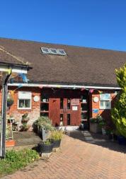 Photo of the front of Derby House.