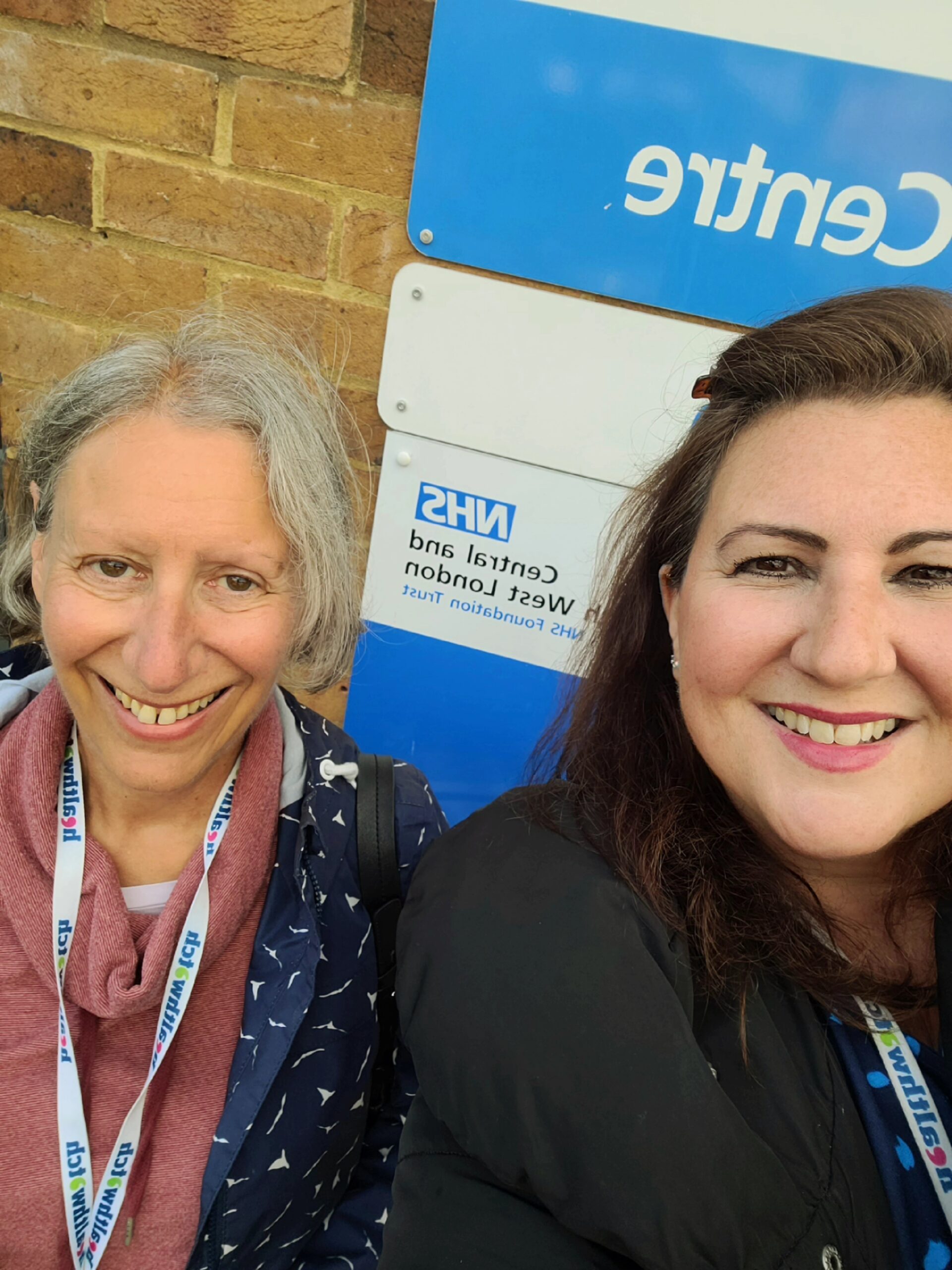 Liz and Sarah outside a sexual health clinic