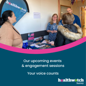 Photo of staff and volunteers listening to someone's experience at Ashford Hospital Community Day.
